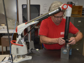 Romer arm operating in engineering department